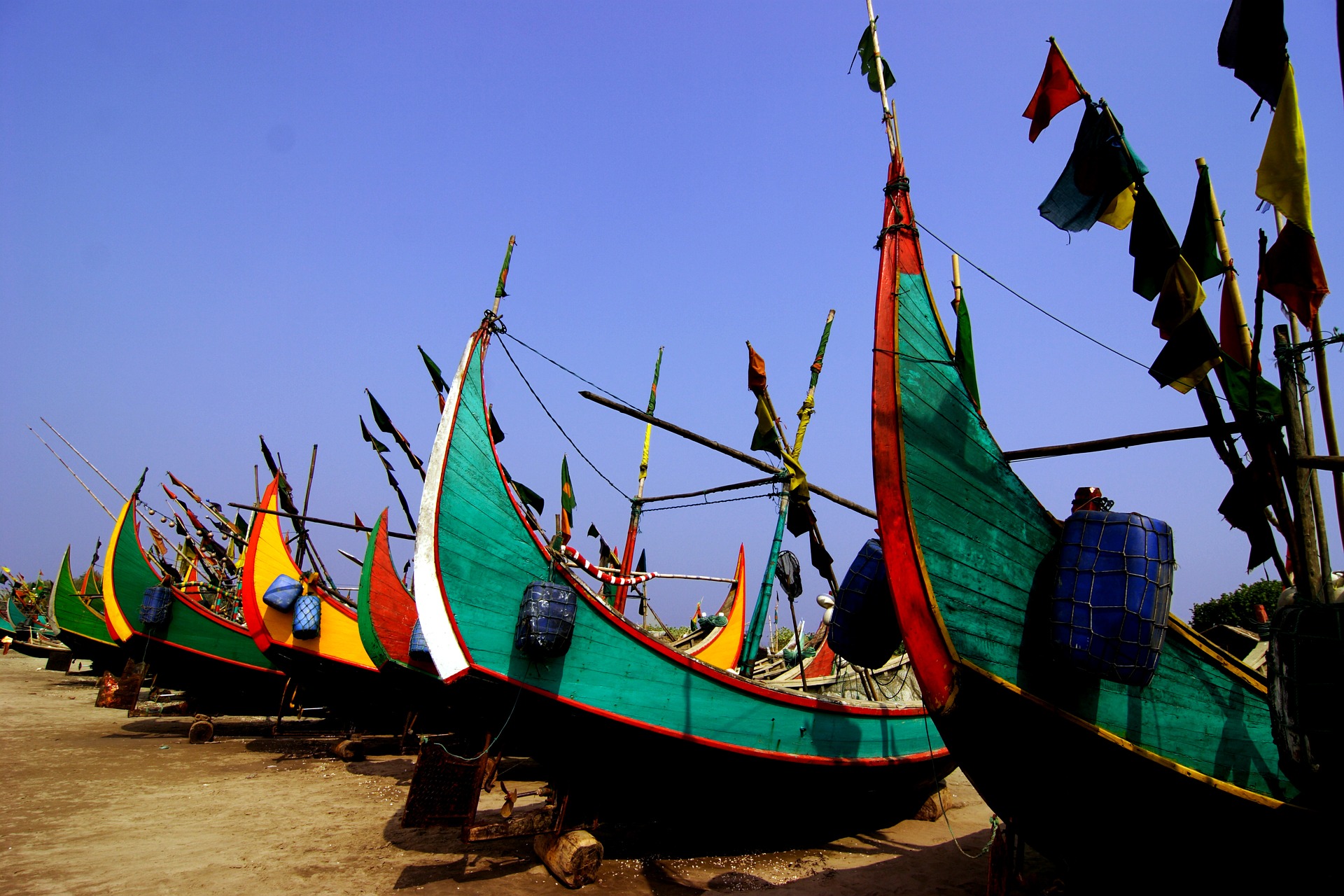 Colorful boats pulled onto the beach