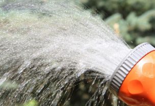 Image of a hose squirting water